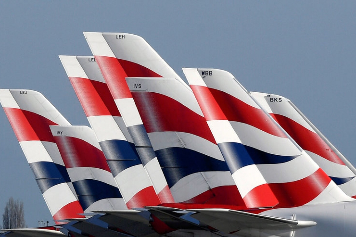 BA suspends more than 30,000 workers, owner scraps dividend